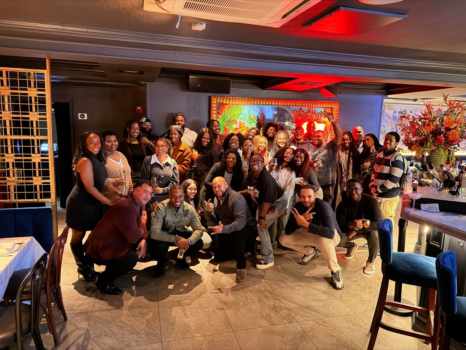 Members of ADW Collective gathered together at a community event.
