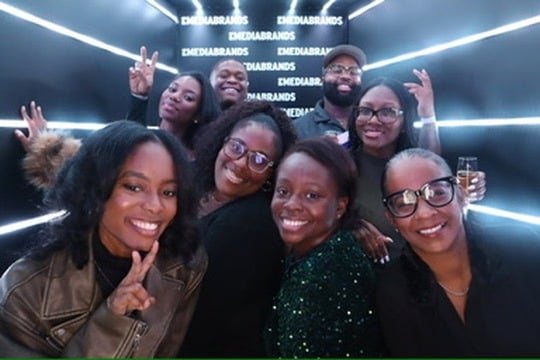 ADW Collective members posing together at an industry event.