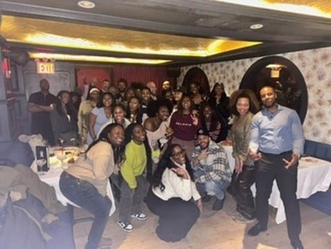 ADW Collective members gathered at an evening venue event.
